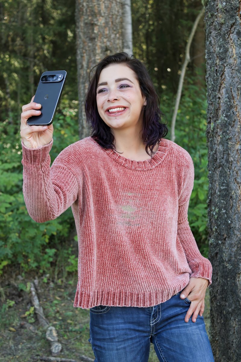 Jordan Johnston taking a selfie outdoors